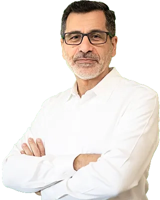 Feras in glasses and white shirt with crossed arms