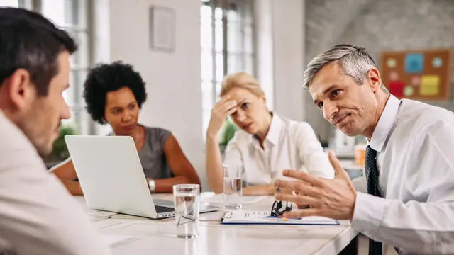 support for departing employees (1) a meeting underway